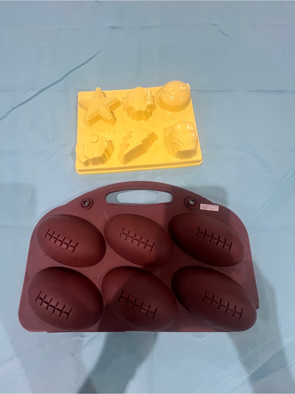 Silicone Football and 2 superhero molds set of 3 items